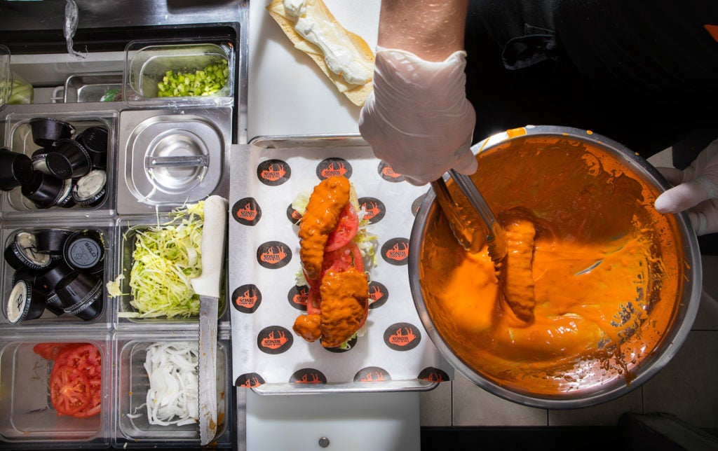 Tourists Eat Wings. Buffalonians Eat Subs.